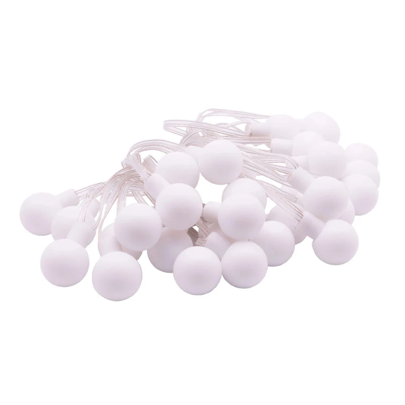 String of white lights on a white background