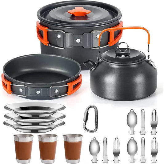 Camping cookware set with pots, pans, kettle, cups, and utensils on a white background