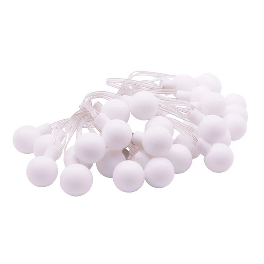 String of white lights on a white background