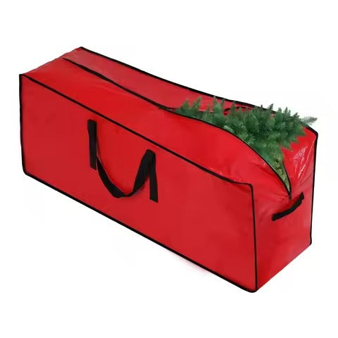 Red storage bag with a handle filled with greenery on a white background