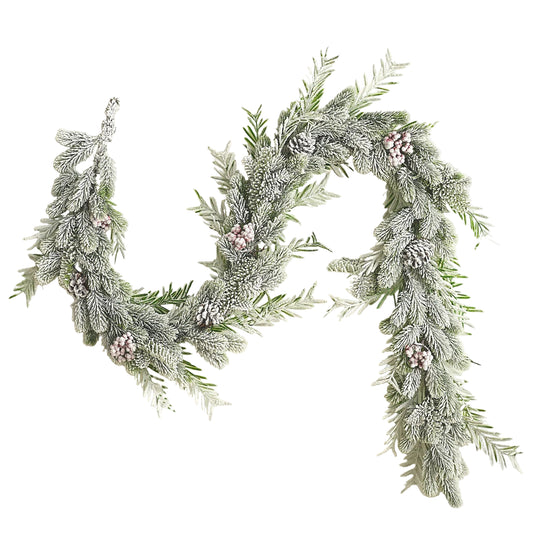 Decorative wreath with greenery and small pink flowers on a light background