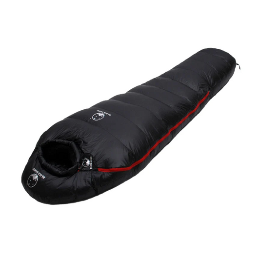Black sleeping bag with red interior on a white background