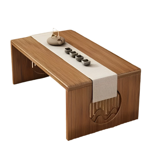Wooden tea table with a white runner and tea sets on a tatami mat floor.